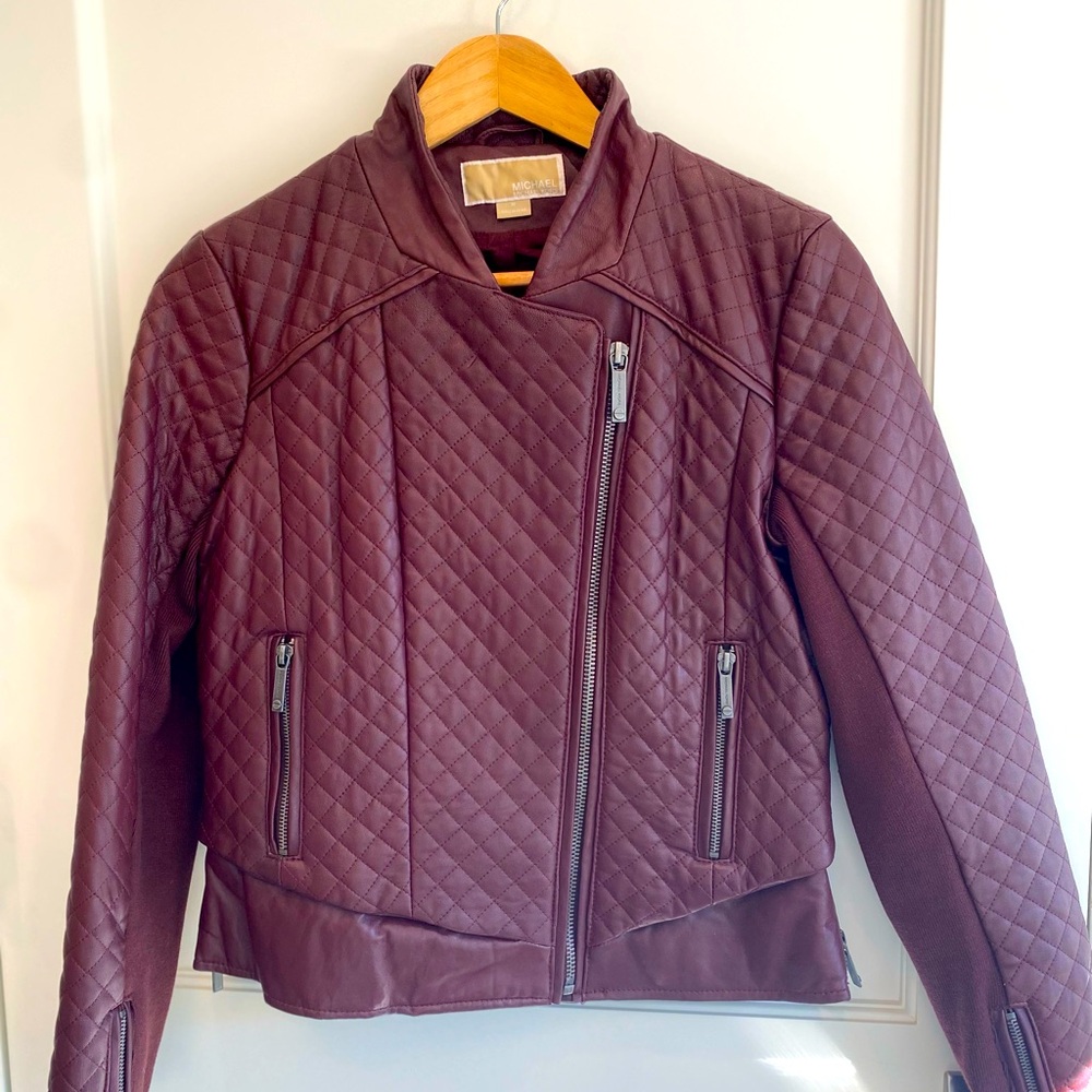 Michael Kors lightly worn 100% burgundy leather jacket